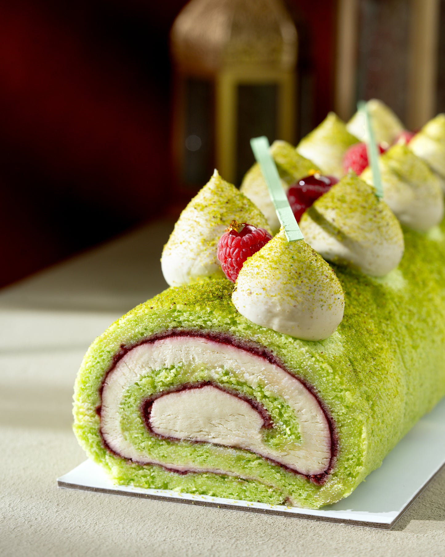 Pistachio Raspberry Roll Cake